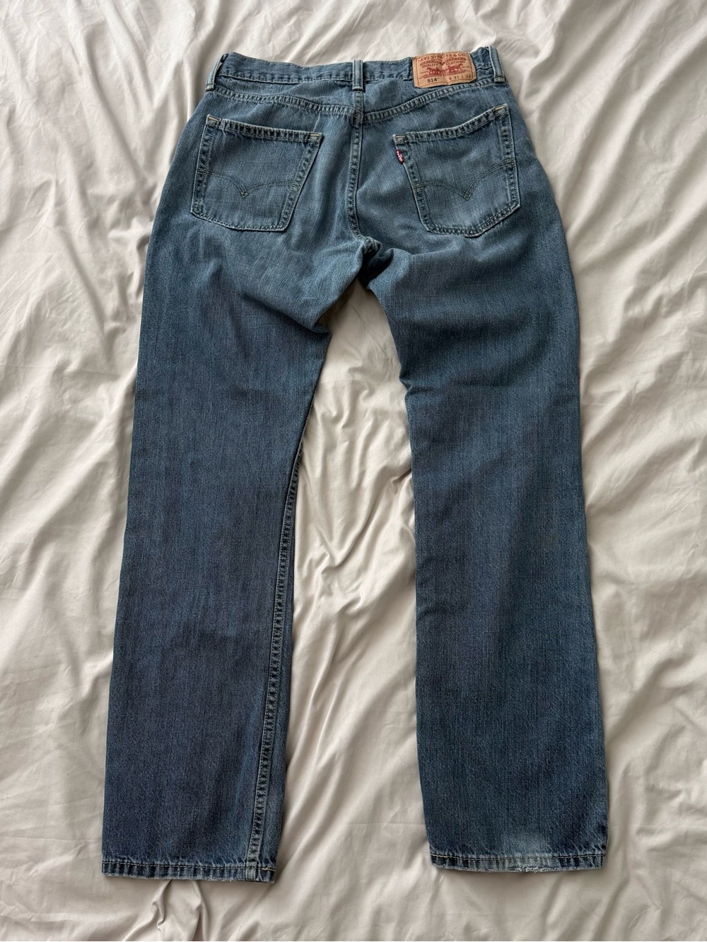 Levi’s 514 Vintage Workwear Distressed Low Rise Bootcut Medium Wash Jeans